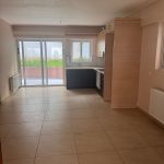 Additional view of living room with access to garden