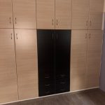 Large closet with shelving and hanging space