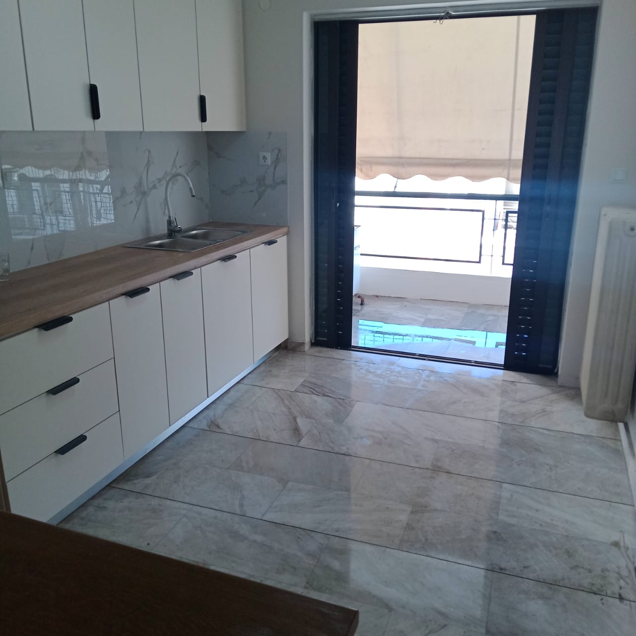 kitchen with access to balcony
